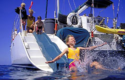 Child sliding into water
